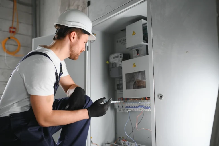 LENA Elektrik Hamburg | a male electrician works in a switchboard with an 2024 05 02 21 21 53 utc Gross